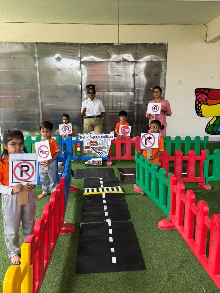 Children holding traffic signs